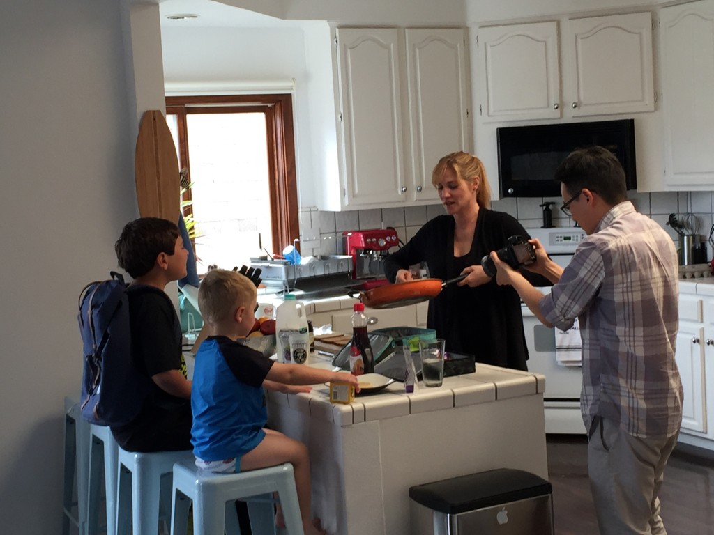 Lori serves her kids their breakfast