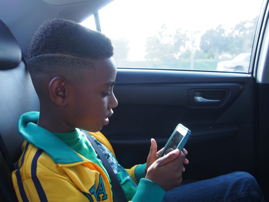 Isaiah getting bored and playing w/ my iphone